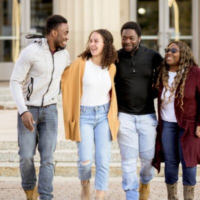 A cute shot of friends joking and laughing together spreading positivity around